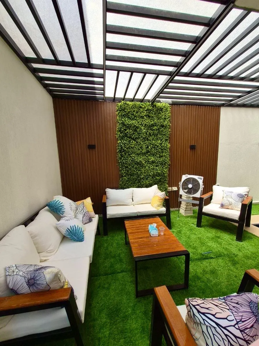 Courtyard lounge seen from the house entrance