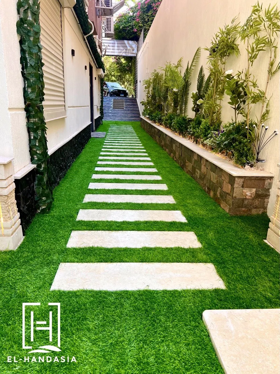 Pool courtyard under a slatted pergola